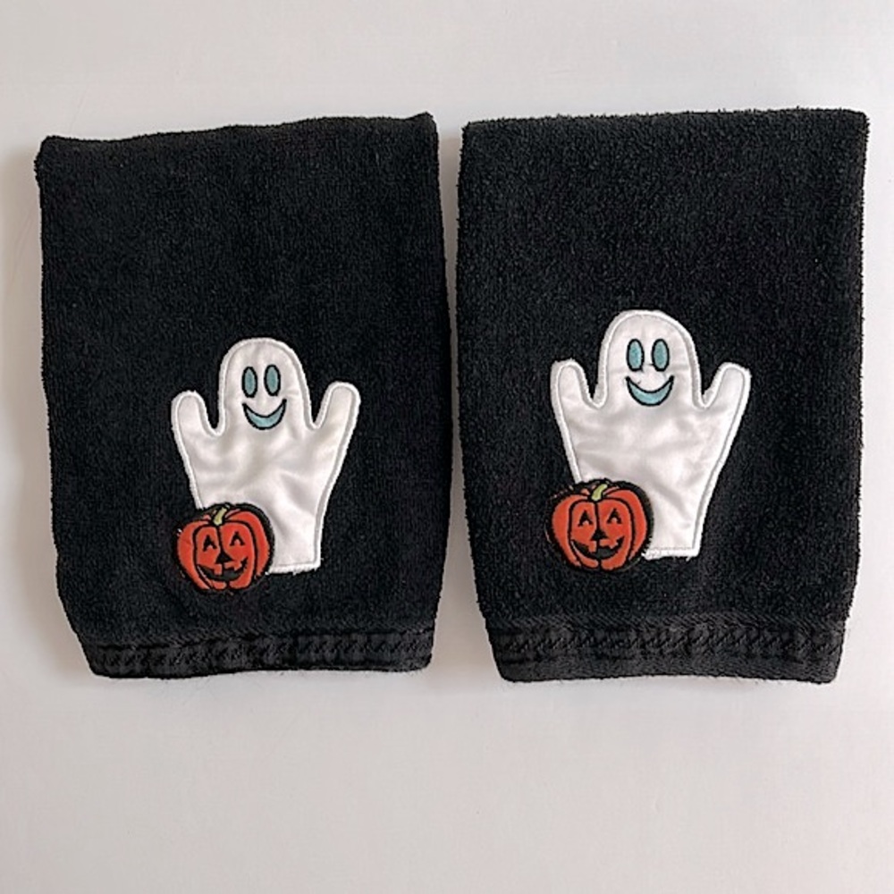 Halloween hand towels with a friendly ghost and pumpkin appliqué